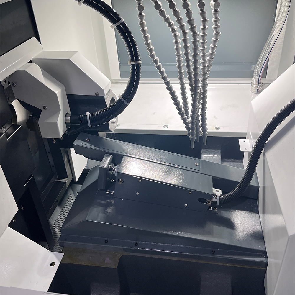 Swiss CNC Lathe Rear Discharge Device